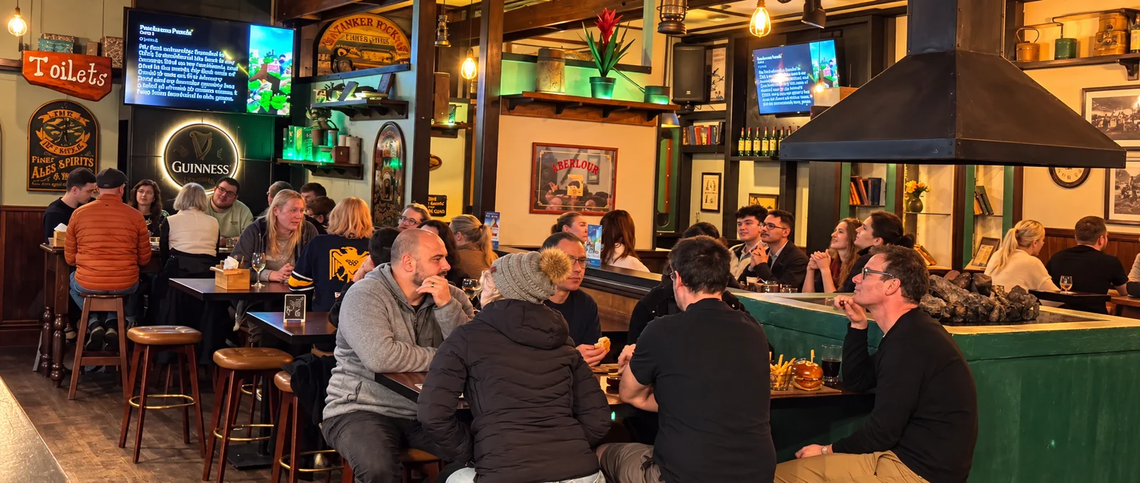 Friends gathering inside Lucky Finns