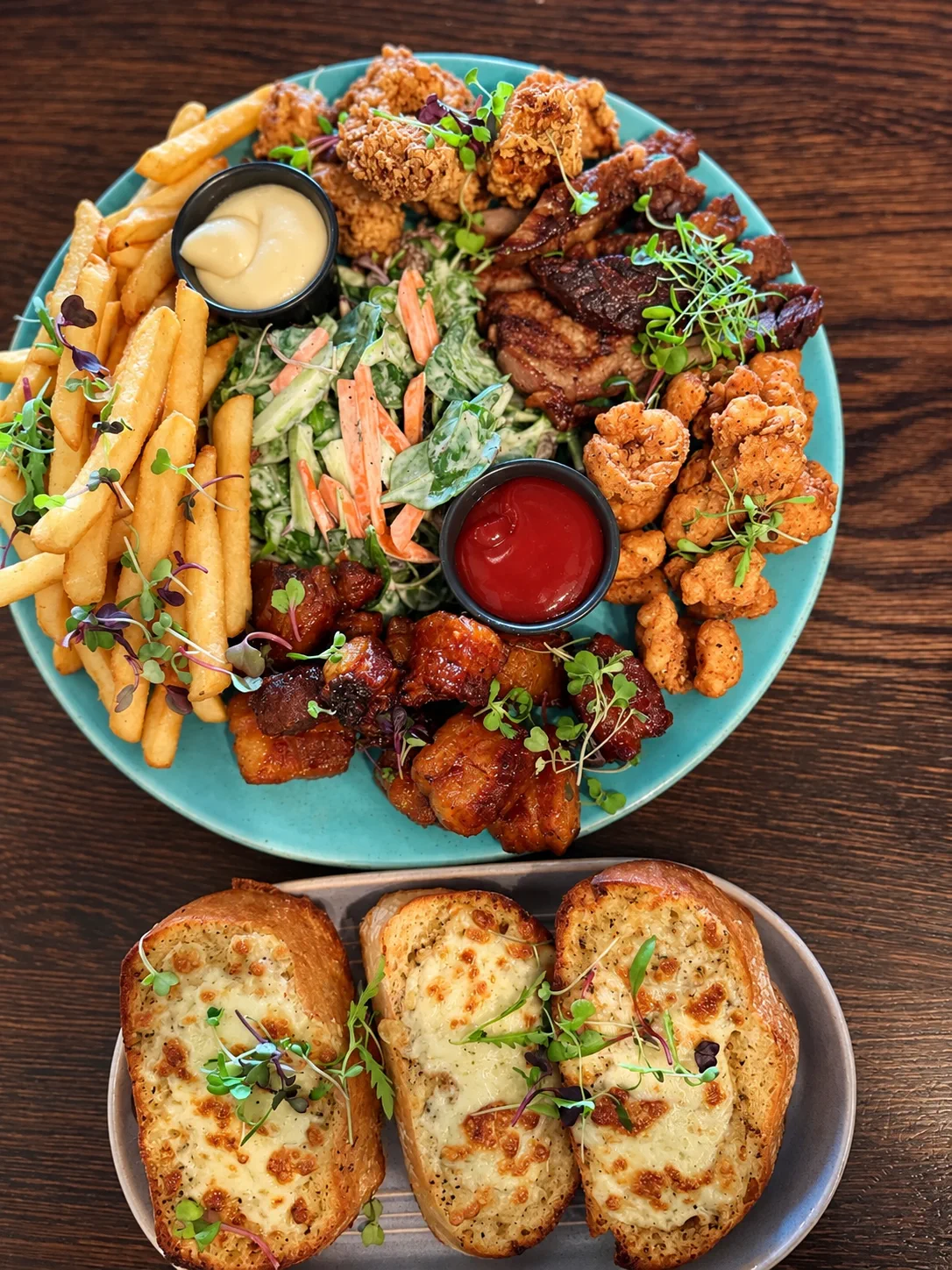 A sharing platter of fried bites, prawns and chips