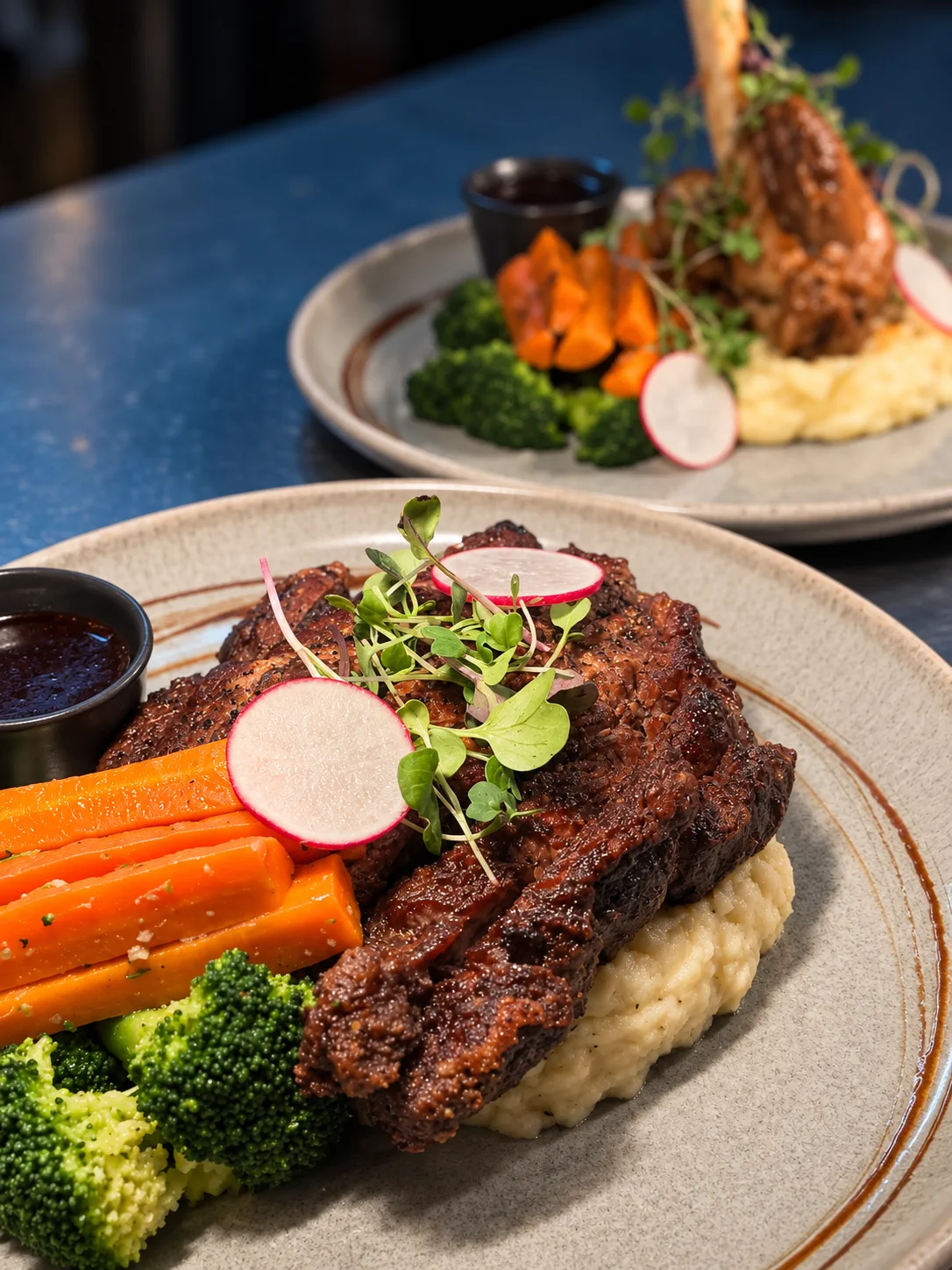 Steak dinner with vegetables and mash at Lucky Finns